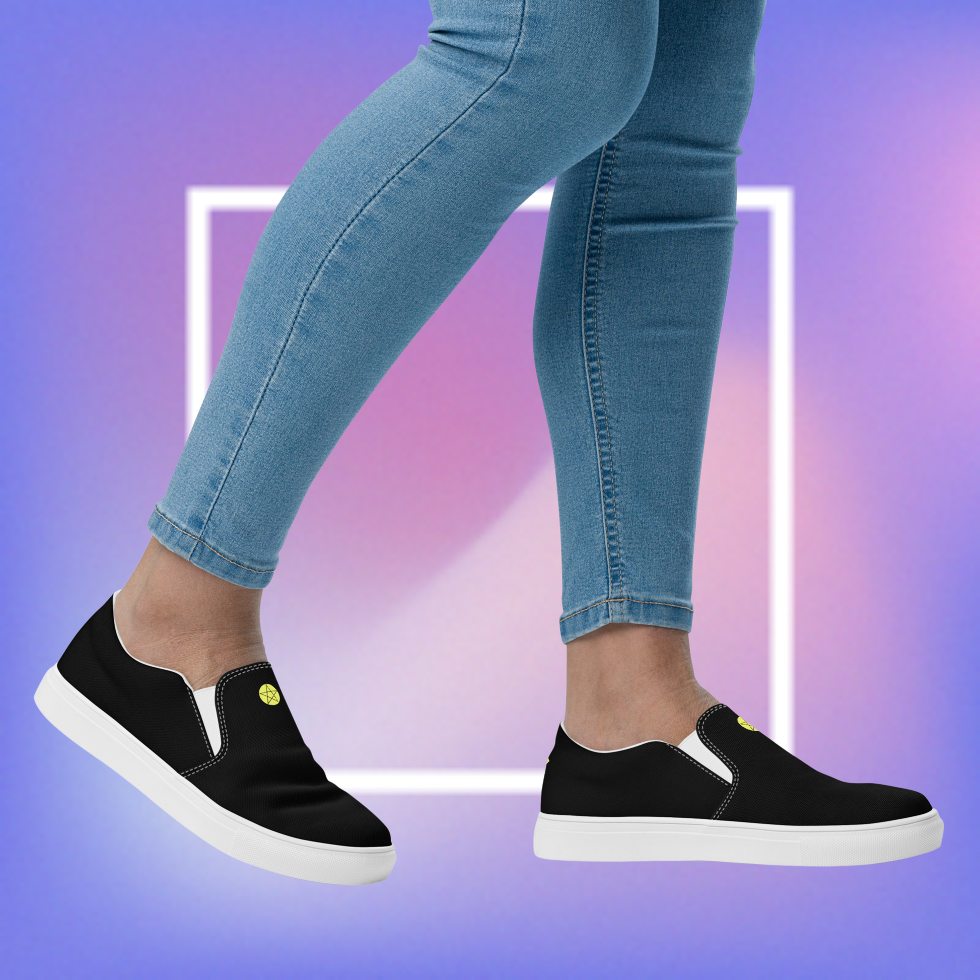 Women's black slip-ons featuring a yellow printed pentacle star in the center  tongue of the shoe and a signature star initialed CS in the center back of the shoe.  