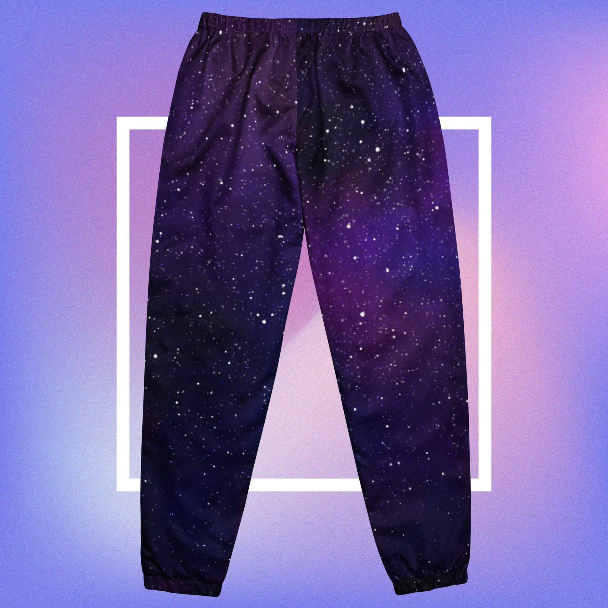 Cozmic Studioz Galaxy CS Track Pants for Women. Trendy track pants with CS initials print, showcasing Cozmic Studioz's signature style.