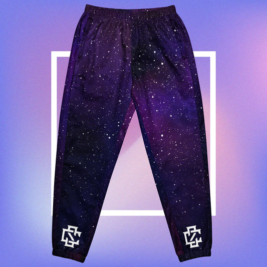 Cozmic Studioz Galaxy CS Track Pants for Women. Trendy track pants with CS initials print, showcasing Cozmic Studioz's signature style.