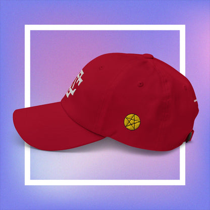 Cozmic Studioz CS Arch Cap for Women: White embroidered CS symbol centered with yellow pentacles on each side of red arched cap.